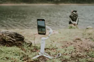 A phone held up filming a video, the kind of mobile editing Alight Motion supports