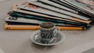 Reading a magazine with a cup of coffee